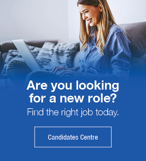 Candidates Centre - Woman looking at job ads on her bed