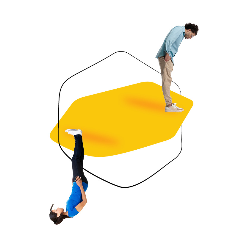 Two people, one standing and one upside-down, on a yellow geometric shape.