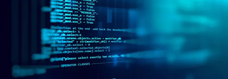 Close-up of blue computer code on a screen, displaying lines of text and commands.