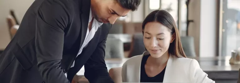 two co-workers in an office setting