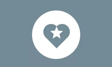 White star inside a heart on a blue background.