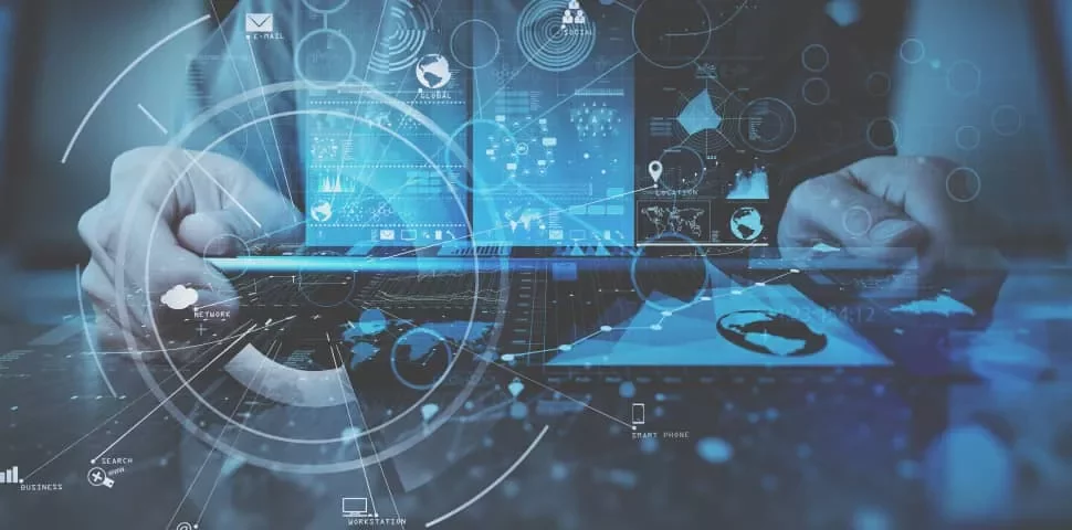 Futuristic digital interface with hands on a laptop, showcasing data and technology elements.