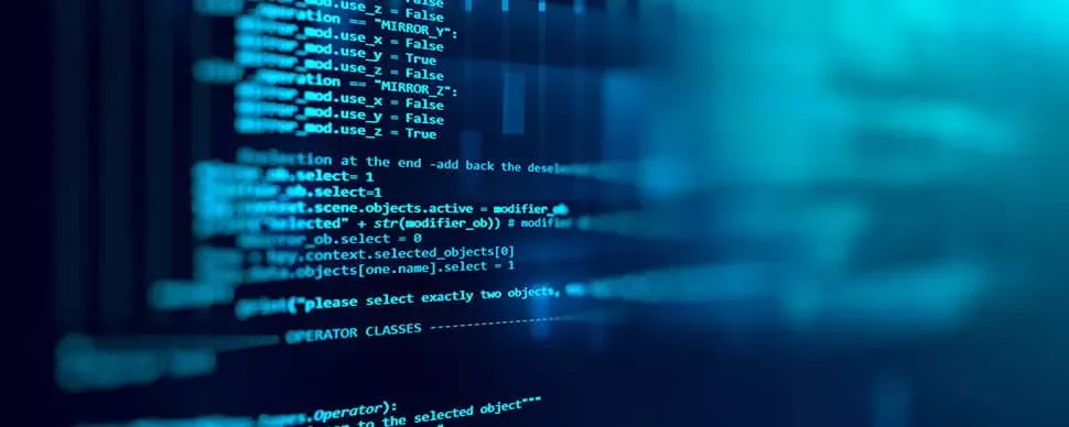 Close-up of blue computer code on a screen, displaying lines of text and commands.